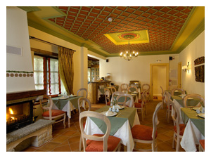 Breakfast room with painted wooden ceiling